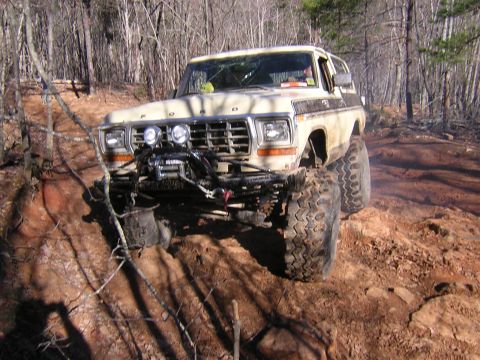 1979 Ford Bronco - This modified 1979 Ford Bronco navigates a challenging off-road course.