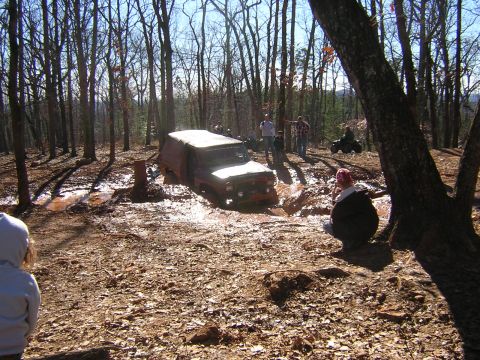 1979 Ford Bronco - Off-road vehicle stuck in mud during a holiday meet and greet event in 2006.