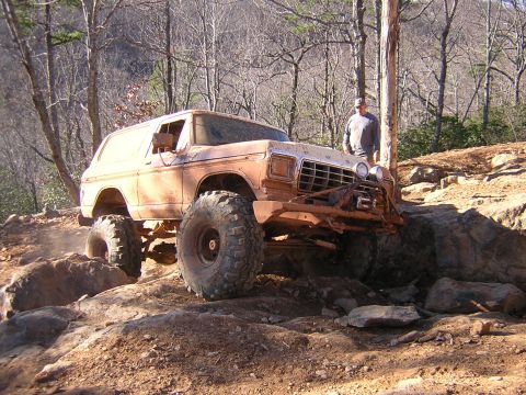 1979 Ford Bronco - A heavily modified 1978 Ford Bronco navigates a challenging off-road course.