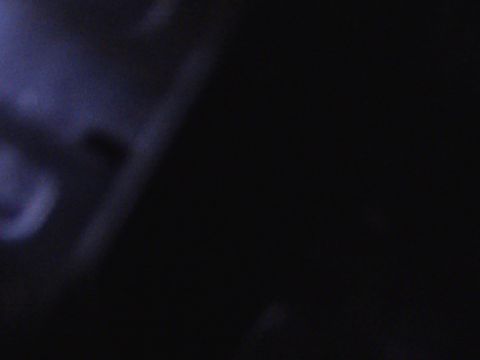 1979 Ford Bronco - The image is predominantly dark with a hint of blue light on the left side.