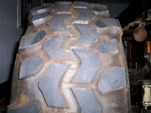 1974 Ford F-100 - A detailed view of a heavy-duty tire tread pattern, with a watermark indicating the source of the image.