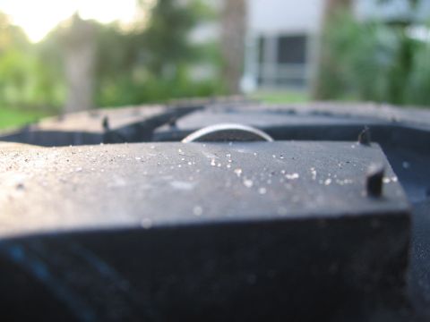 1974 Ford F-100 - Tire tread detail shows block pattern and surface debris.
