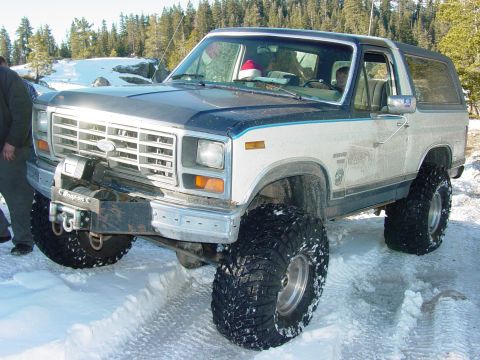 1986 Ford Bronco - This modified Ford Bronco is equipped for off-road conditions in a snowy environment.