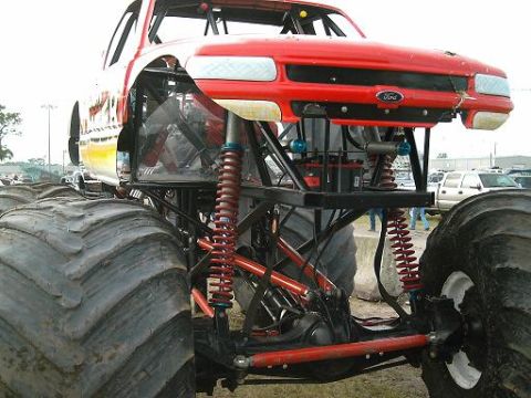 1986 Ford Bronco - This modified 1986 Ford Bronco monster truck features oversized tires and a lifted suspension system.