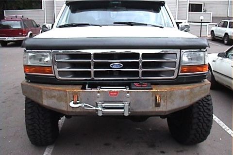 1993 Ford Bronco - Front view of a 1992 Ford Bronco equipped with a winch bumper and aftermarket grille.