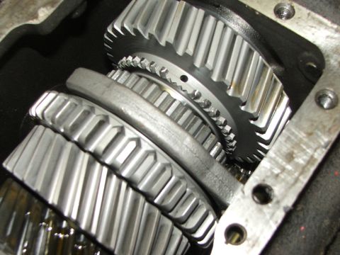 1965 Ford Mustang - Close-up view of internal transmission gears within a housing.