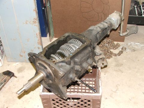 1965 Ford Mustang - A close-up view of a manual transmission gearbox, showing its internal gears.
