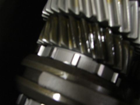 1965 Ford Mustang - This image shows a close-up view of meshing gears, suggesting internal mechanical components.