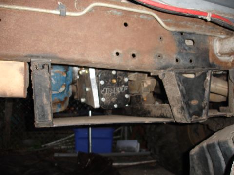 1989 Ford Bronco - Close-up of a vehicle's frame with a fuel pump installed.