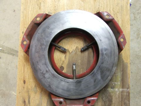 1965 Ford Mustang - A clutch pressure plate is shown, a component of a vehicle's transmission system.