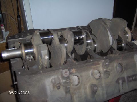 1978 Ford Bronco - Close-up view of an engine block with a crankshaft, likely part of a rebuild project.