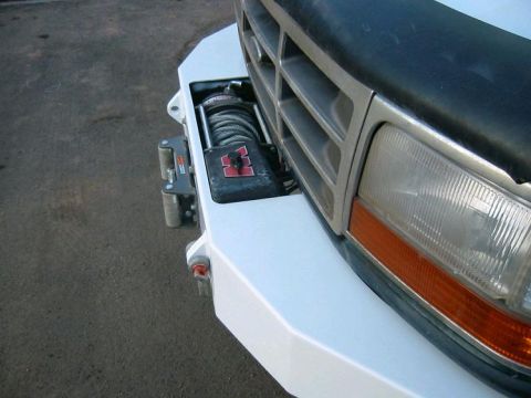 1993 Ford Bronco - This truck features a custom front bumper with an integrated winch, partially obscuring the grille.