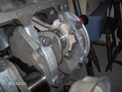 1978 Ford Bronco - Close-up view of an engine's crankshaft and connecting rod assembly, showing internal mechanical components.