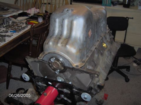 1978 Ford Bronco - Engine block and oil pan assembly, likely during a rebuild or repair process.