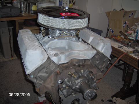 1978 Ford Bronco - Engine assembly with Edelbrock air cleaner and silver valve covers.