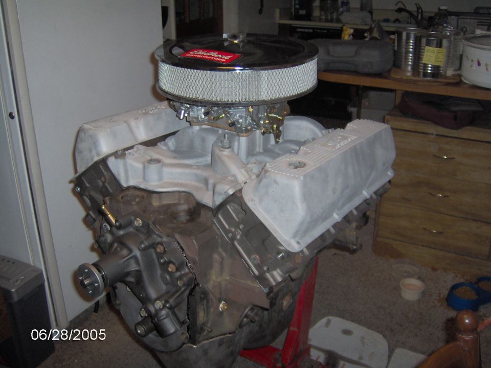 V8 engine on a stand, showing Edelbrock air cleaner and valve covers. Date stamp 06/28/2005