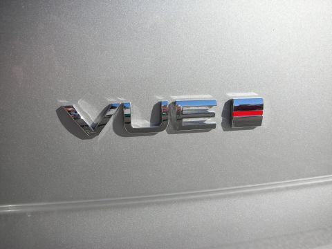 1992 Ford Crown Victoria - Close-up of the 'Vue' emblem on a silver vehicle, indicating the model name.