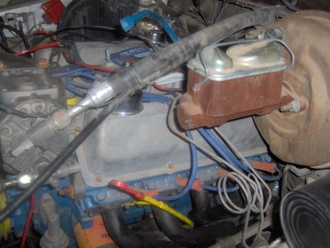 1978 Ford Bronco - Close-up view of an engine bay, showing various components and wiring.