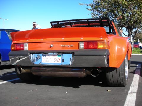 1992 Ford Crown Victoria - Rear view of an orange Porsche 914-6 with a California license plate.