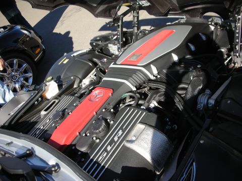 1992 Ford Crown Victoria - Engine bay of a Mercedes-Benz SLR McLaren, showing the V8 engine and surrounding components.