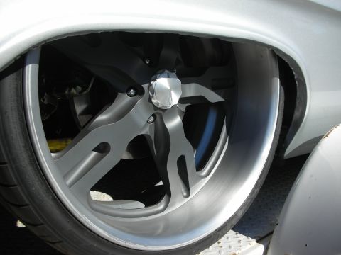 1992 Ford Crown Victoria - A custom wheel with a unique spoke design and a brushed metal finish is shown in detail.