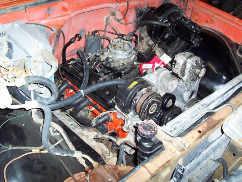 1972 Chevrolet C/K Pickup - Engine bay view of a V8 engine with various components visible.