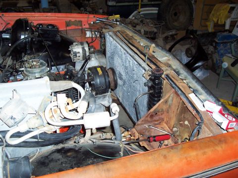 1972 Chevrolet C/K Pickup - Close-up view of a vehicle's engine bay, focusing on the radiator and engine components.