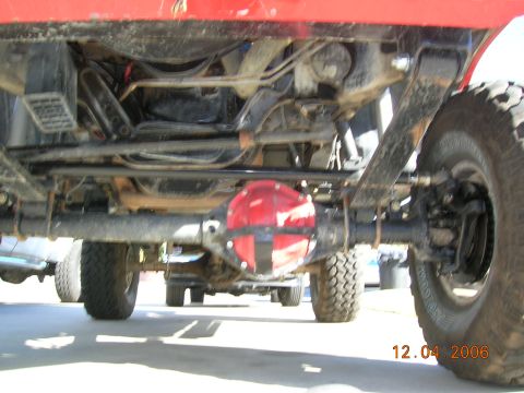 1985 Ford Bronco - Undercarriage detail of a modified 4x4, showing the differential and suspension components.