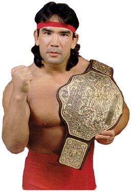 1991 Ford Bronco - A wrestler poses with a championship belt.