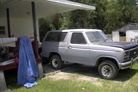 1984 Ford Bronco - This Ford Bronco appears to be undergoing some work, with its hood painted black and the body in a silver primer.