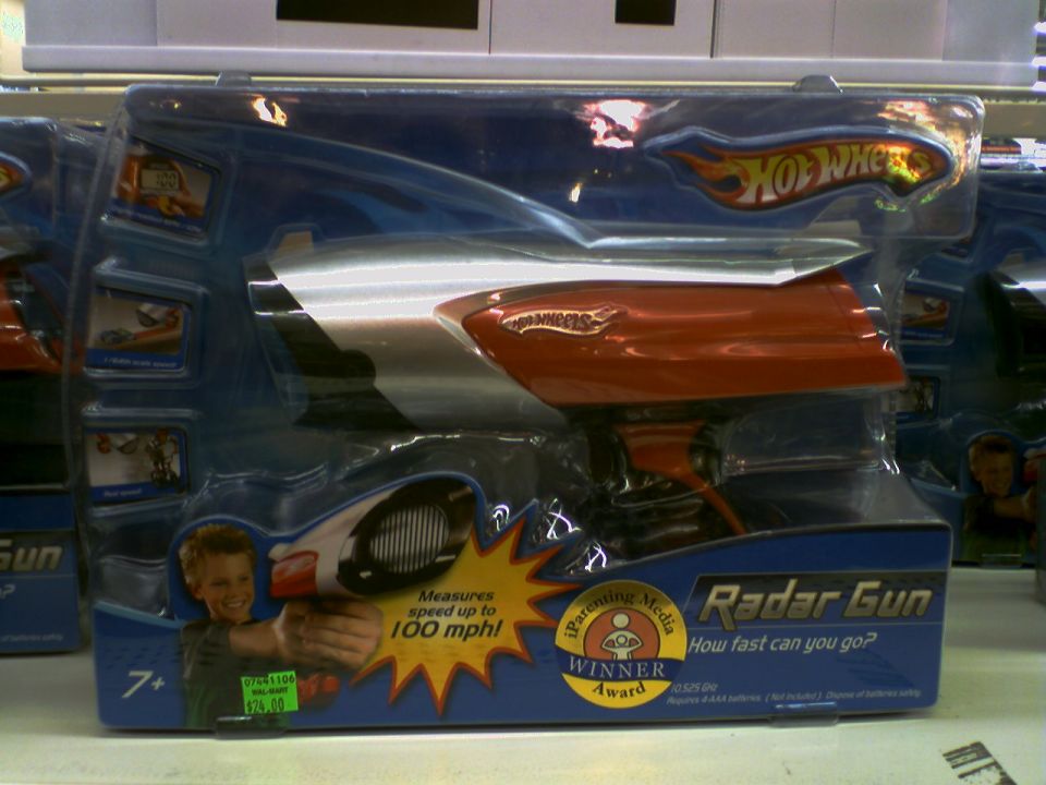 Hot Wheels Radar Gun toy in packaging, red and silver with orange accents