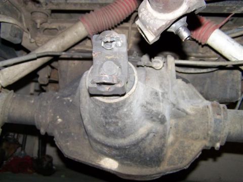1995 Ford Bronco - Close-up of the rear axle assembly, showing the differential and part of the driveshaft.