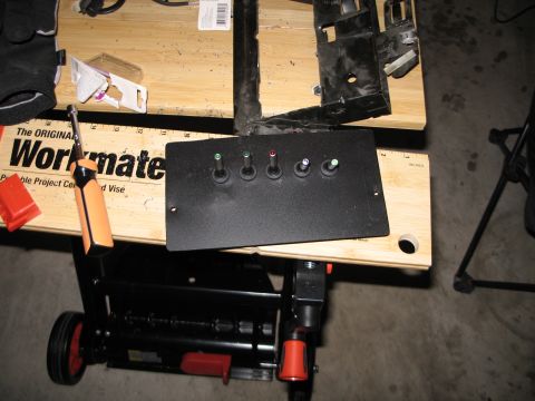 1995 Ford Bronco - Aftermarket switch panel with five toggle switches, possibly for custom vehicle wiring.