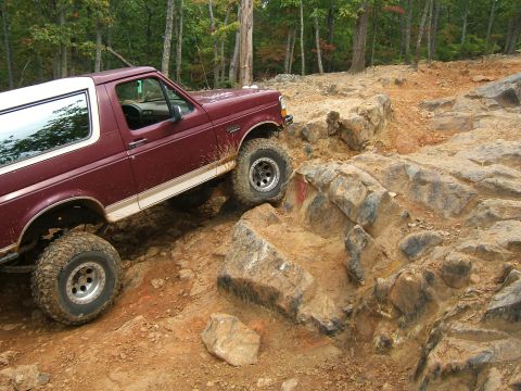 1993 Ford Bronco - This 1993 Ford Bronco navigates a challenging rocky terrain on an off-road trail.