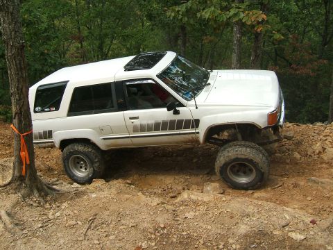 1993 Ford Bronco - This modified 1980s Toyota 4Runner navigates a challenging off-road course.