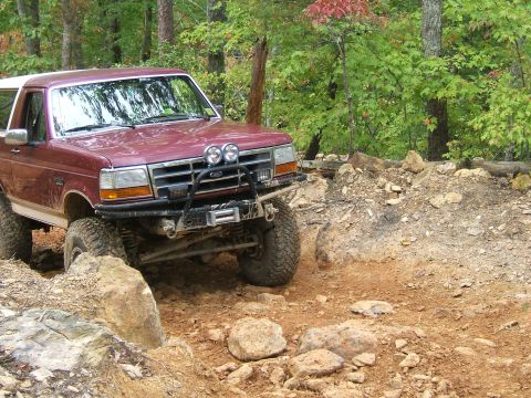 1993 Ford Bronco - This 1993 Ford Bronco is tackling a challenging off-road course.