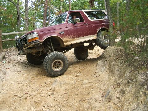 1993 Ford Bronco - A modified Ford Bronco tackles a challenging off-road course.
