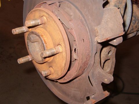 1999 Ford Crown Victoria - My e-brake pedal had NO resistance, and when I pulled the rear rotors, I found why: the friction material is gone. Also, the drums are rust…