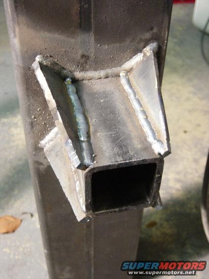 1990 Ford Bronco - This photo shows a close-up of a welded metal bracket, not a 1990 Ford Bronco rear bumper.