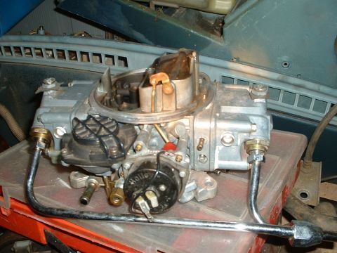 1985 Ford Bronco - Close-up of a Holley carburetor, a crucial engine component.