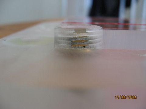 1994 Ford Bronco - A close-up view of a layered object with a visible date stamp.