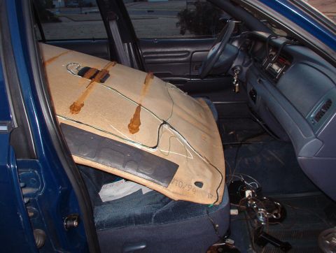 1999 Ford Crown Victoria - The headliner will fall into place on the package shelf & on the seats. It can then be positioned over the C-pillars & lifted into place.
