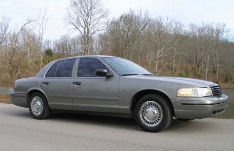2001 Ford Crown Victoria - This 2001 Ford Crown Victoria is shown from a 3/4 front angle, highlighting its sedan body style.