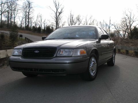 2001 Ford Crown Victoria - Front 3/4 view of a 2001 Ford Crown Victoria sedan.