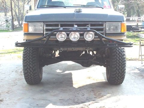 1988 Ford Bronco - Front view of a 1988 Ford Bronco showing its grille and custom bumper.