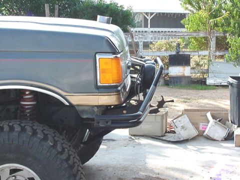 1988 Ford Bronco - Close-up of the front fender and bumper assembly on a 1988 Ford Bronco.