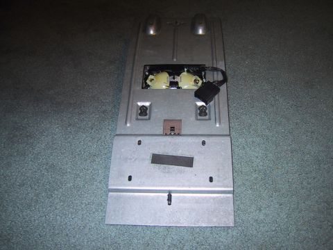 1994 Ford Bronco - Overhead console part with visible wiring and connectors, likely for interior lighting or controls.