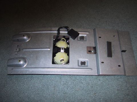 1994 Ford Bronco - This is a part of a vehicle's overhead console, likely containing lights.