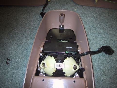1994 Ford Bronco - Interior part of an overhead console, showing wiring and light fixtures.