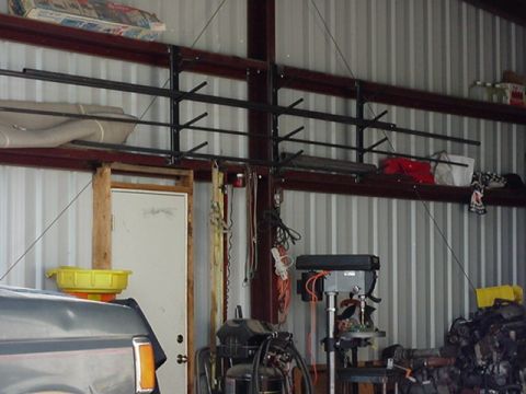 1988 Ford Bronco - The image shows a storage area with shelves holding various items, and a portion of a vehicle's interior.